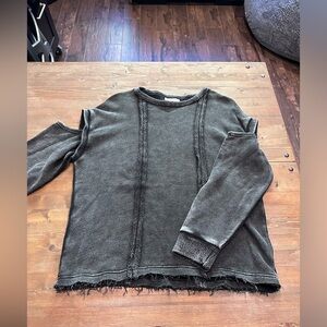 Black sweatshirt with arm cutouts